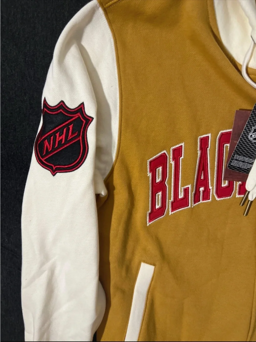 Mitchell & Ness Blackhawks Hooded Varsity Jacket in Gold & White